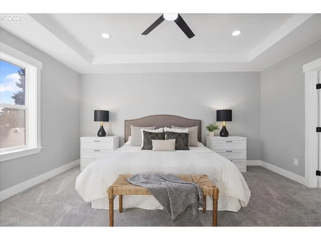 a bedroom with a bed and window