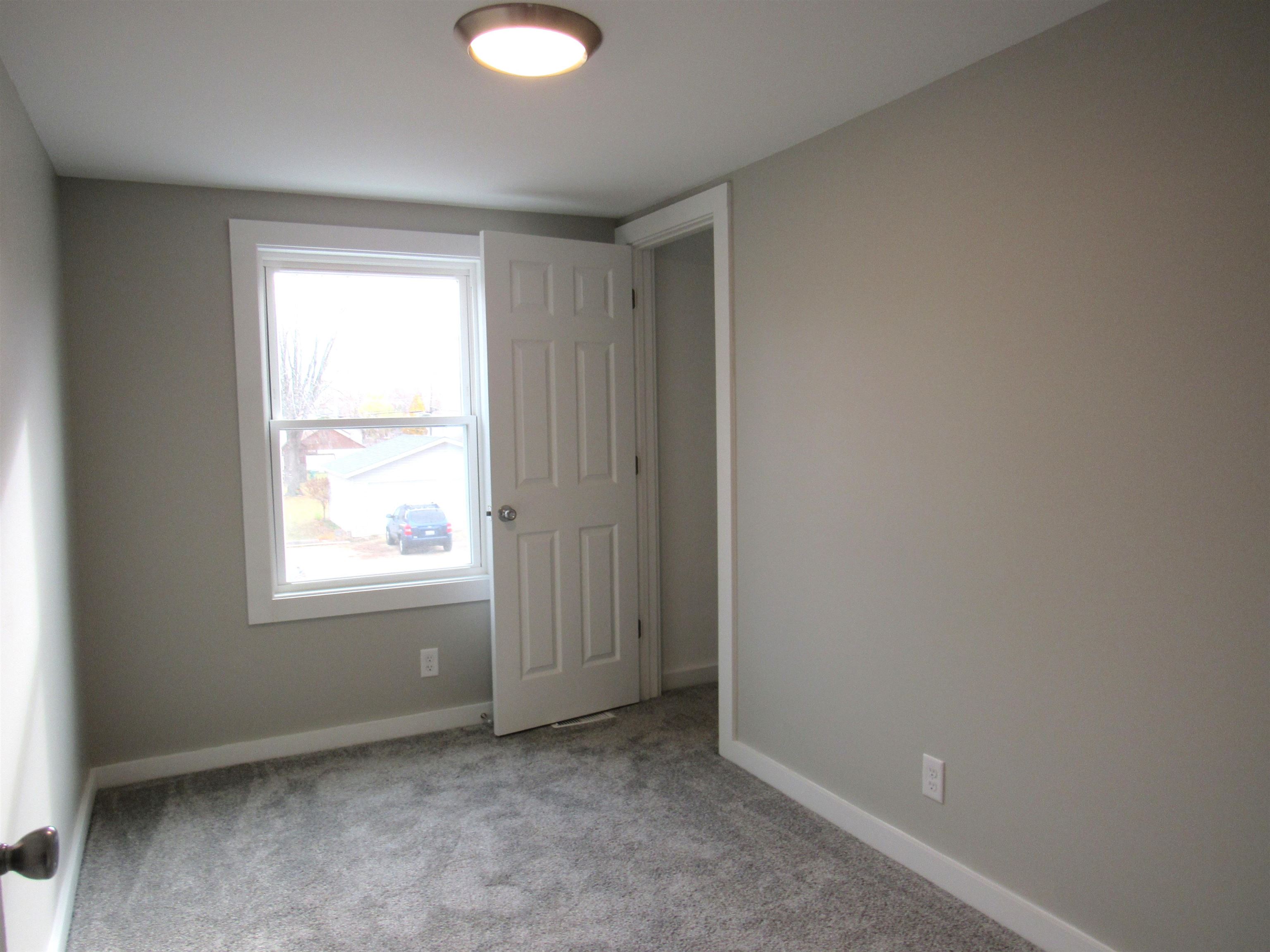 336 Belteberg Road Loves Park, IL 61111 - Photo 11 of 23 an empty room with a window