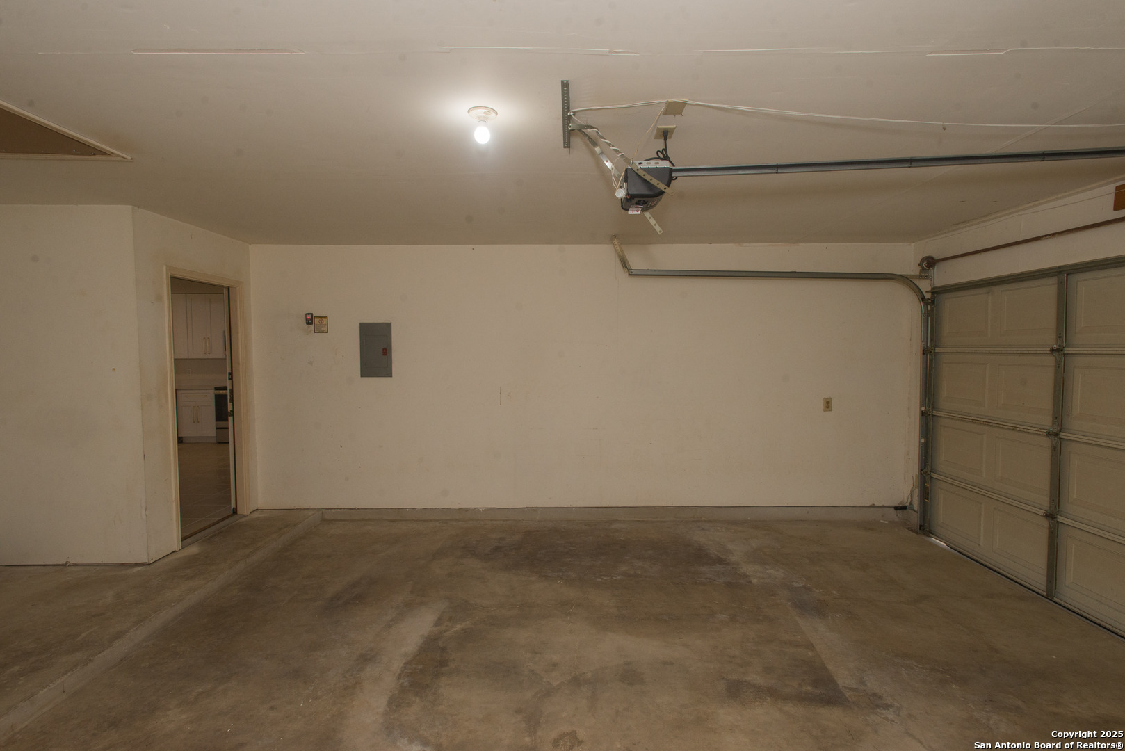 8914 Timber Run San Antonio, TX 78250 - Photo 15 of 23 a view of a room with racks on the wall