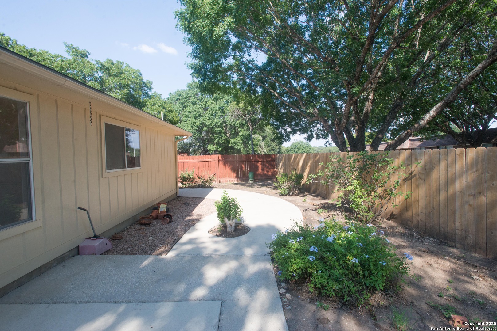 8914 Timber Run San Antonio, TX 78250 - Photo 16 of 23 a view of a yard with a tree