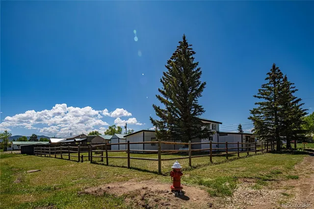 a view of a lobby with chair and tables