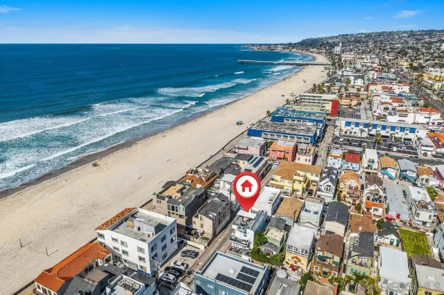 a view of a city with an ocean view