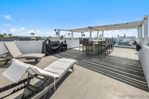 a view of a terrace with seating area