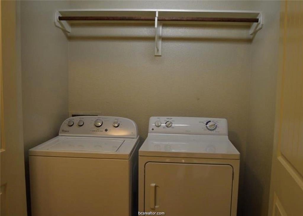 4309 Old College Road Bryan, TX 77801 - Photo 6 of 10 Dedicated utility area featuring a top-load washing machine and a front-load dryer