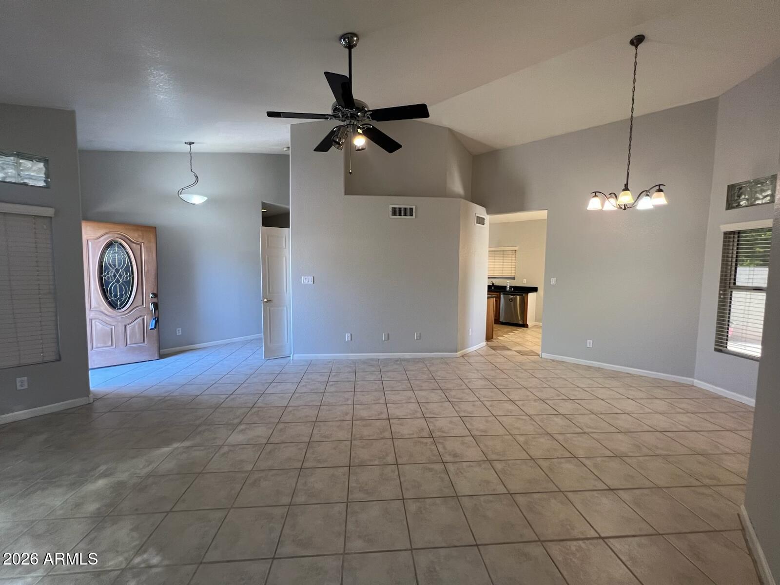 261 West Verano Place Gilbert, AZ 85233 - Photo 2 of 17 a view of a livingroom with a chandelier