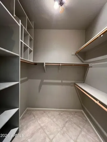 a view of an empty walk in closet