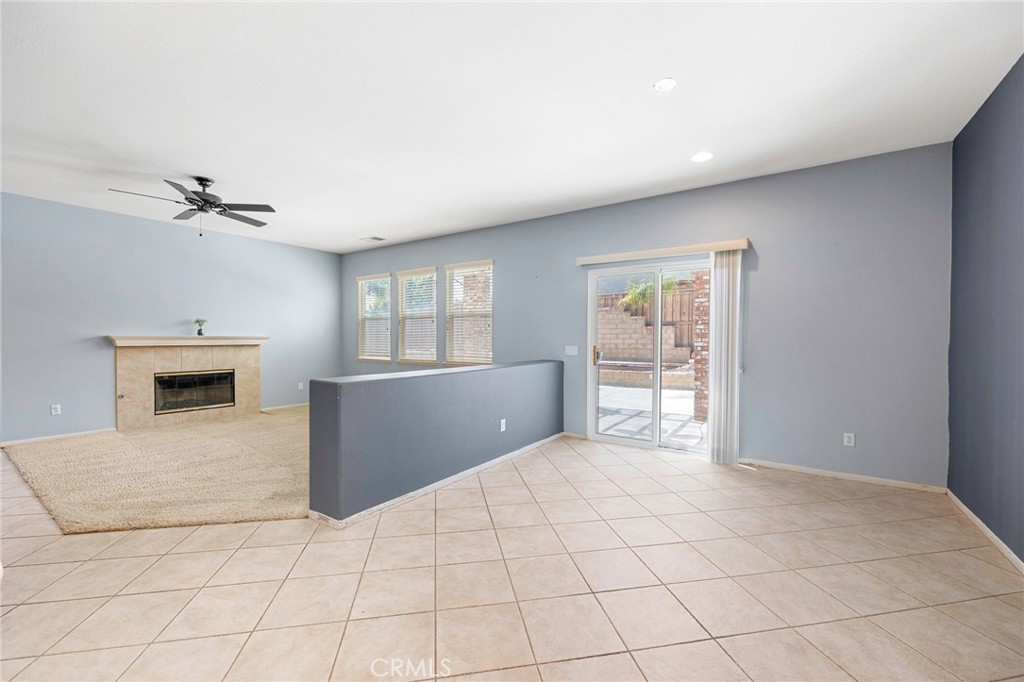 151 Ropango Way Hemet, CA 92545 - Photo 12 of 28 a view of an empty room with a fireplace