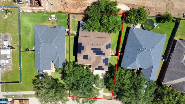 a view of a room with chandelier and entryway