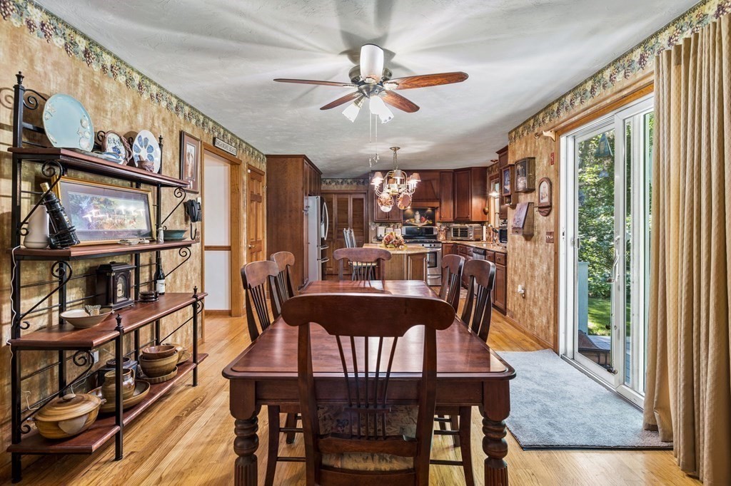 28 Crowell Road Bourne, MA 02562 - Photo 19 of 42 a view of a dining room with furniture window and wooden floor