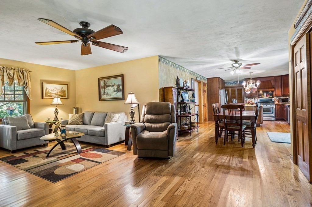 28 Crowell Road Bourne, MA 02562 - Photo 20 of 42 a living room with furniture and wooden floor