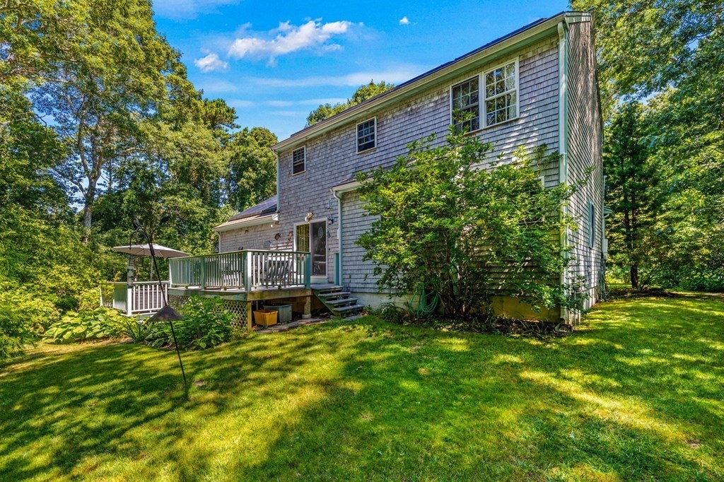 28 Crowell Road Bourne, MA 02562 - Photo 34 of 42 a front view of a house with a yard
