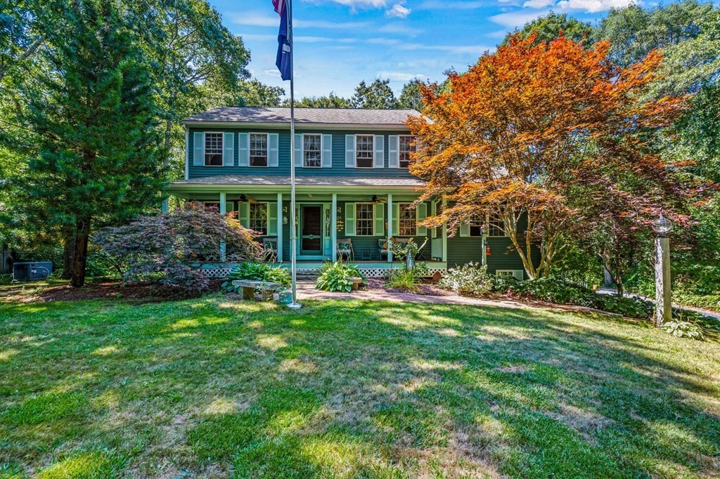 28 Crowell Road Bourne, MA 02562 - Photo 7 of 42 a view of a house with a yard porch and sitting area