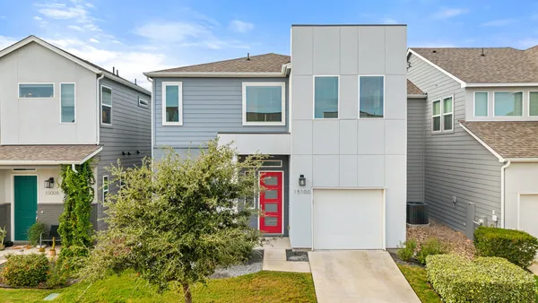 a front view of house with yard
