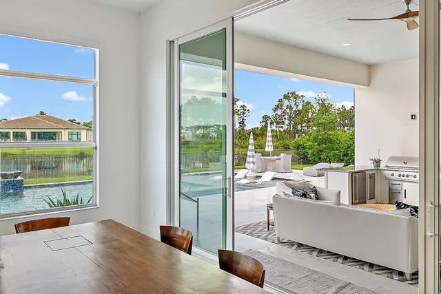 a view of walk in closet with clothes