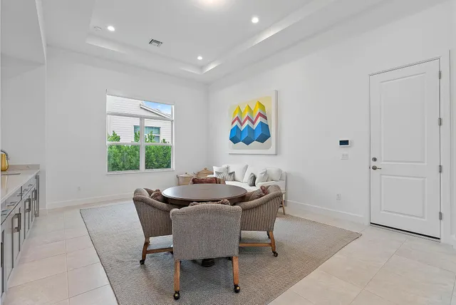 a bathroom with a double vanity sink toilet and shower