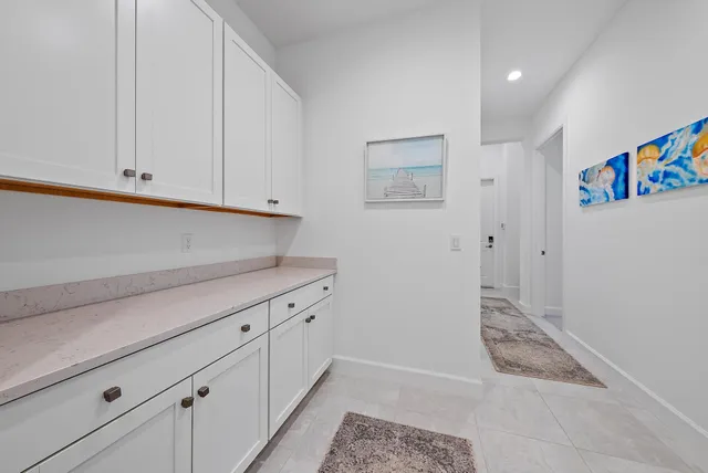 a bathroom with a sink toilet and mirror