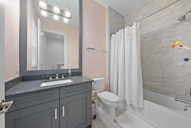 a view of a house with backyard porch and sitting area