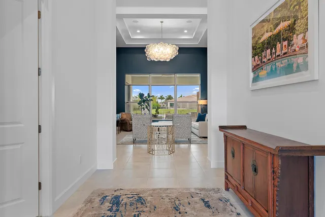 a living room with a couch and a table in it