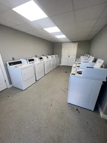 a utility room with washer and dryer