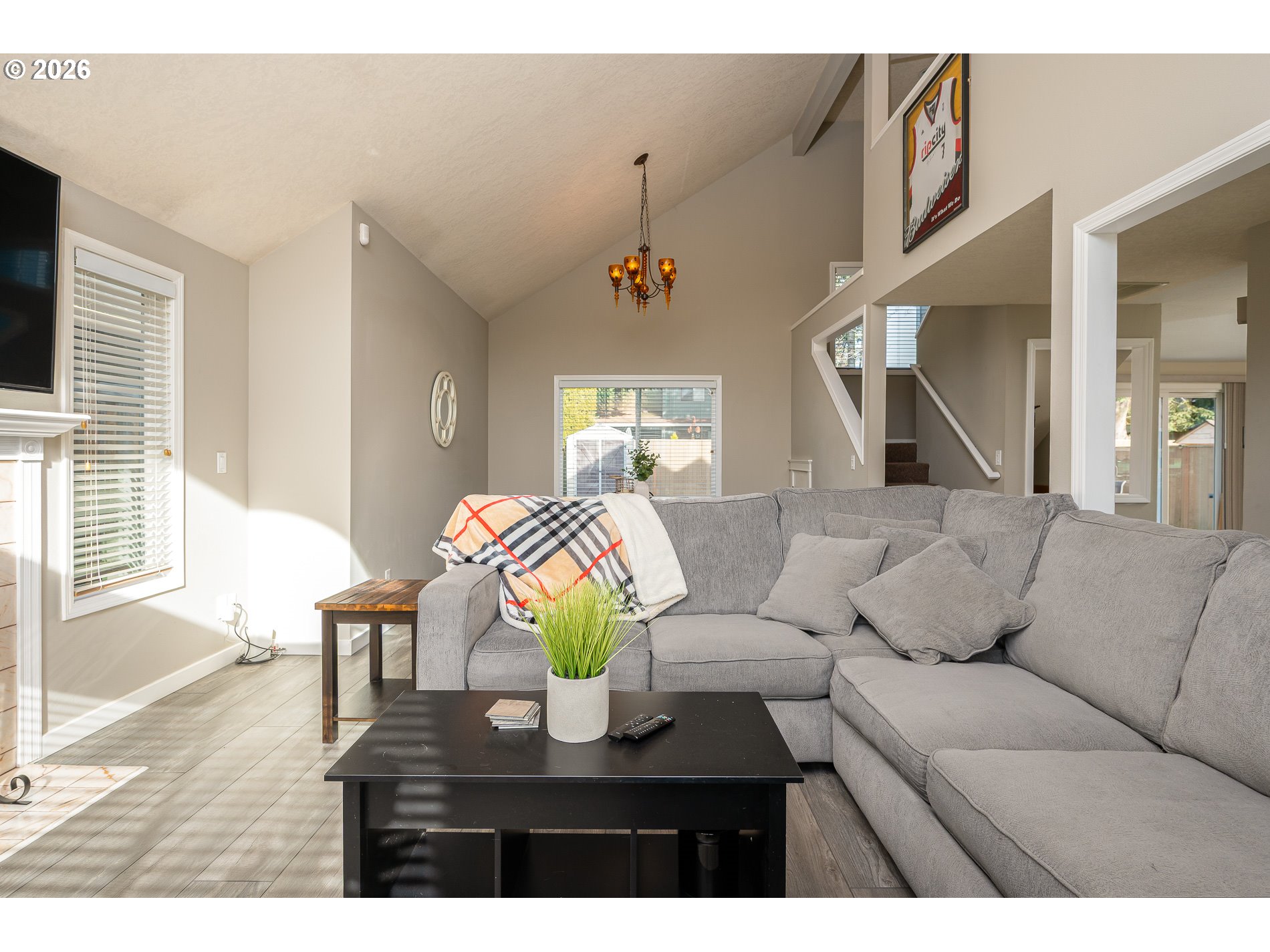 8670 Southwest Stratford Court Tigard, OR 97224 - Photo 11 of 42 a living room with furniture and a wooden floor