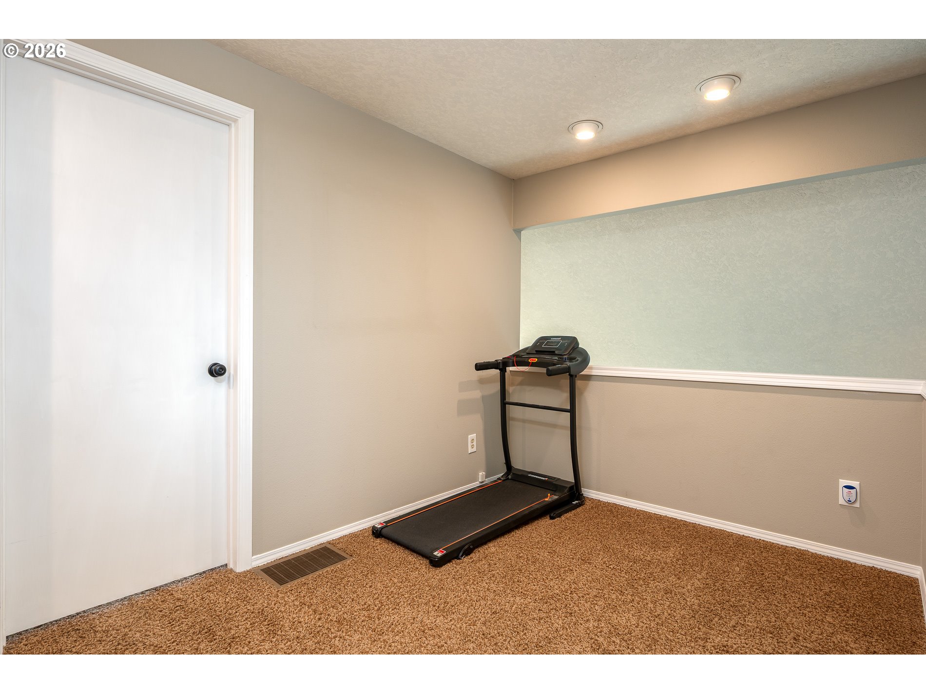 8670 Southwest Stratford Court Tigard, OR 97224 - Photo 25 of 42 a view of a room with gym equipment