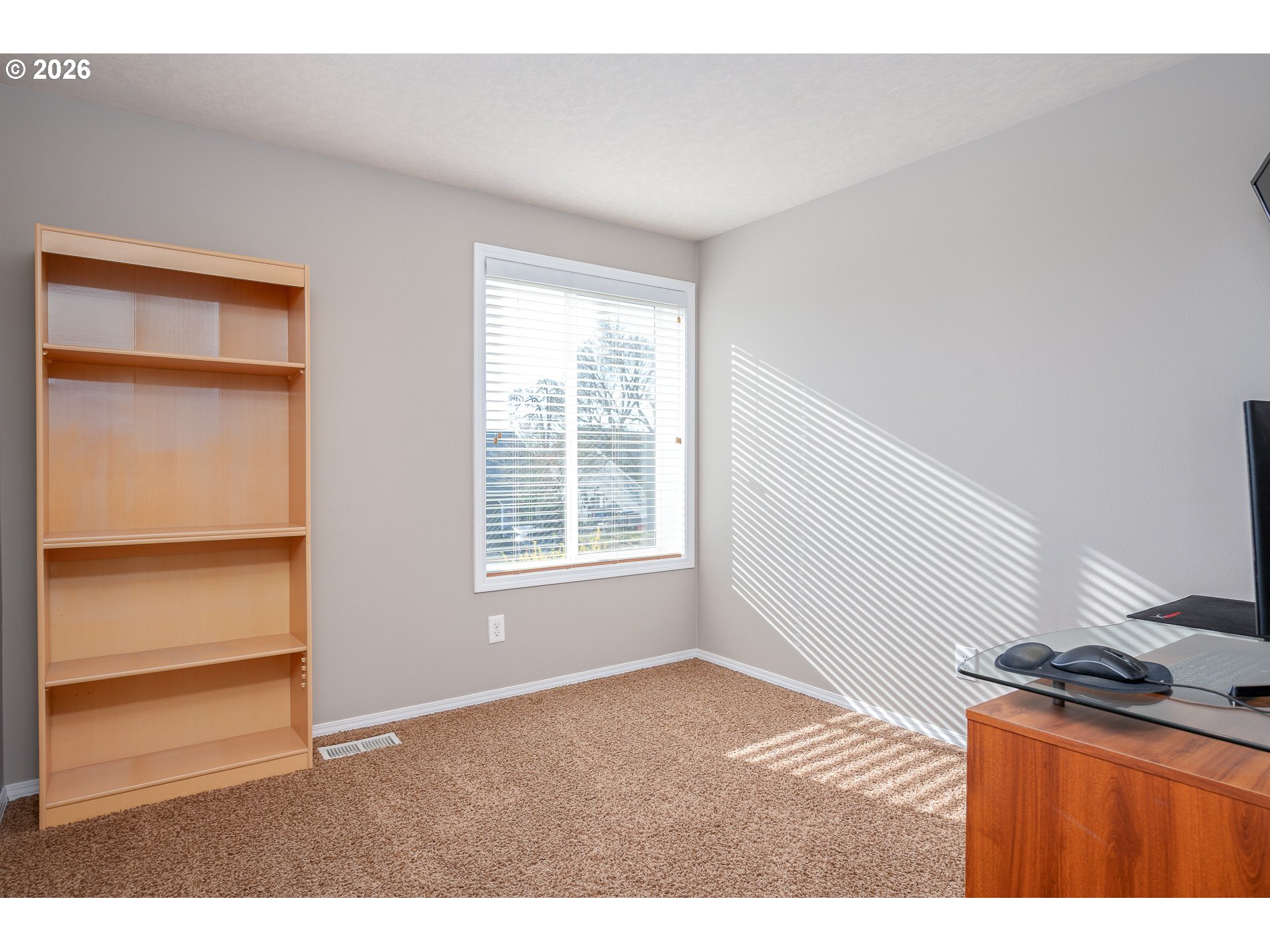 8670 Southwest Stratford Court Tigard, OR 97224 - Photo 32 of 42 a view of an empty room with a window