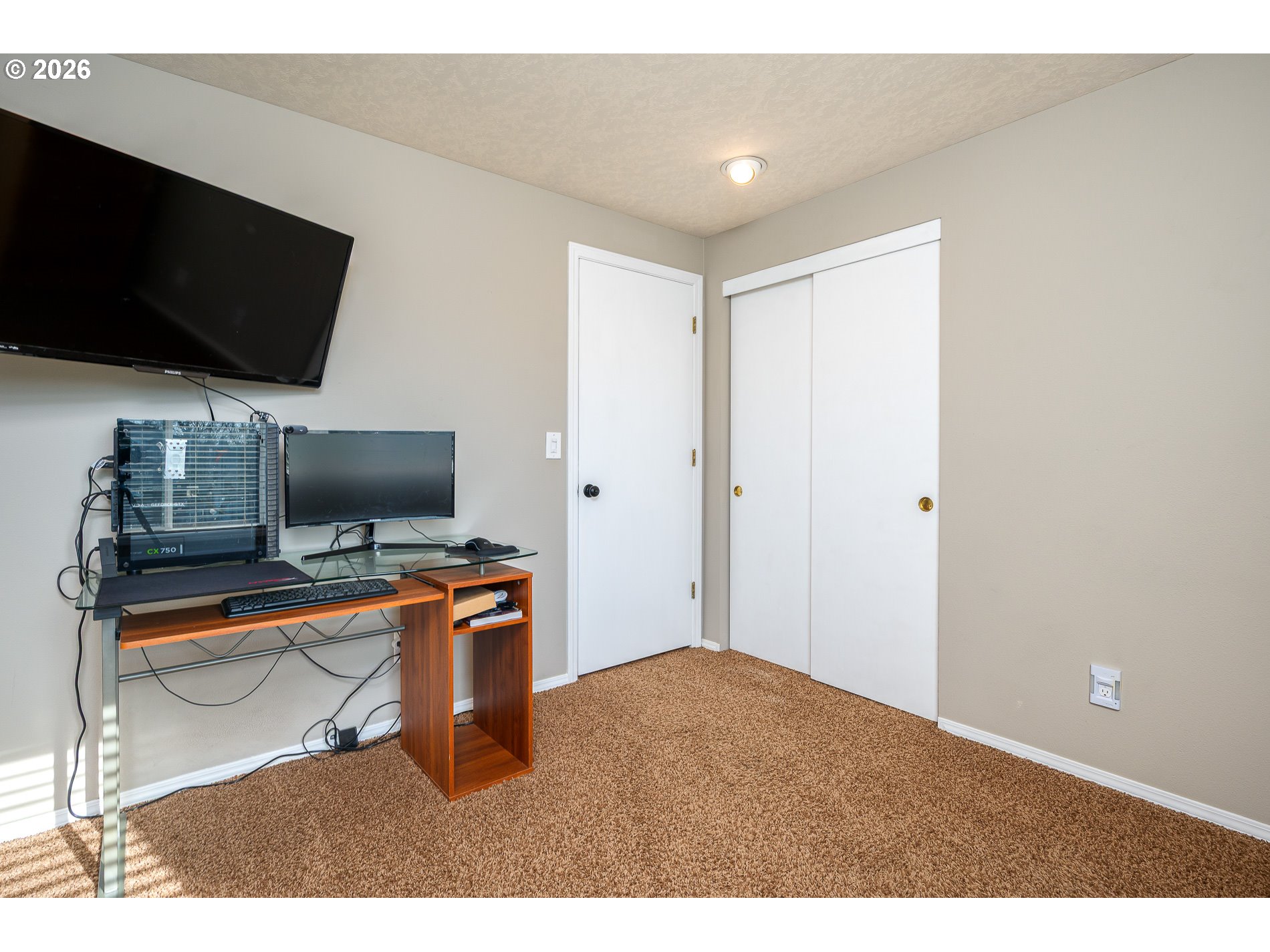 8670 Southwest Stratford Court Tigard, OR 97224 - Photo 33 of 42 a bedroom with a workspace