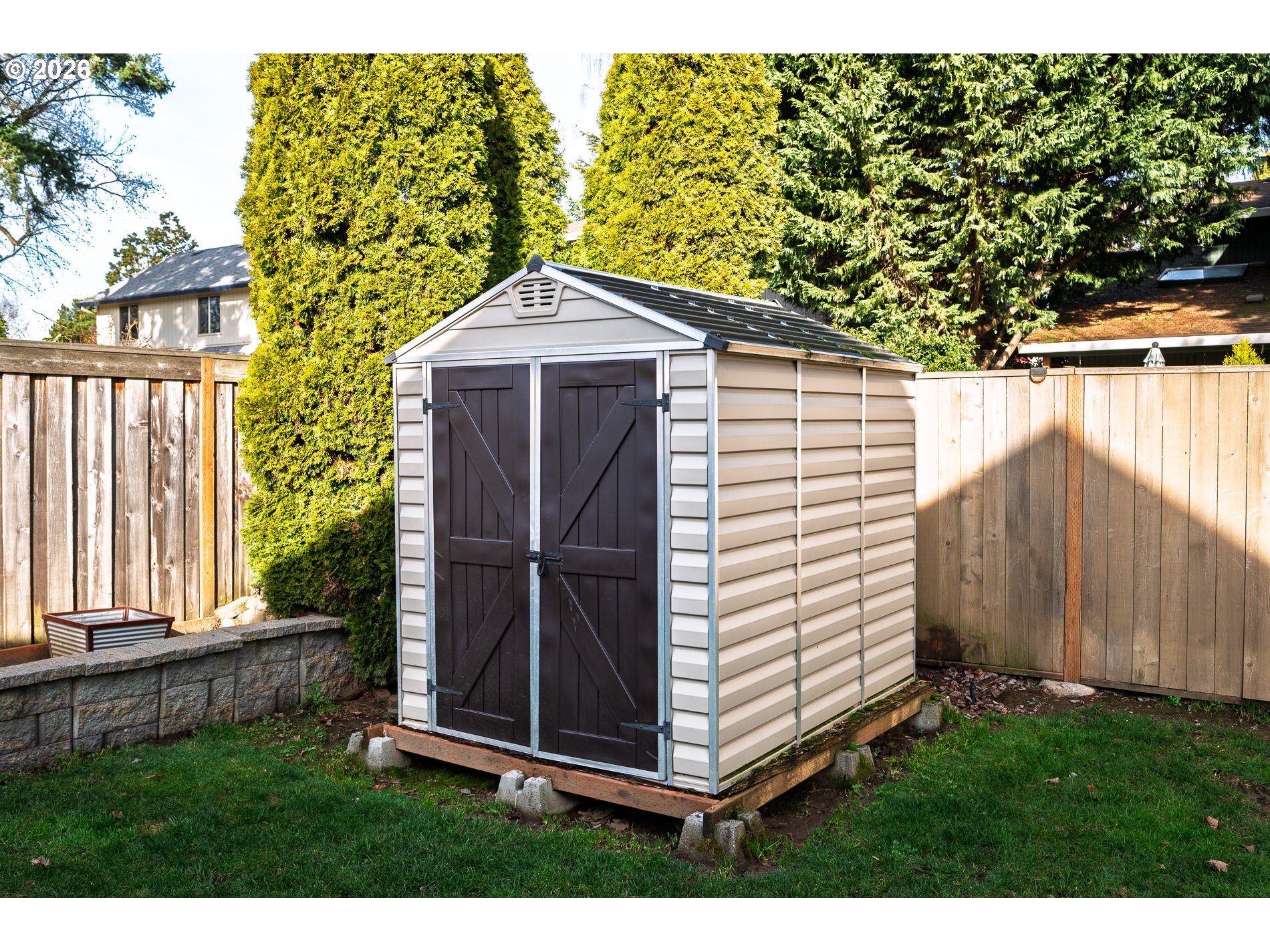 8670 Southwest Stratford Court Tigard, OR 97224 - Photo 39 of 42 a view of backyard with a barn and a cactus plant