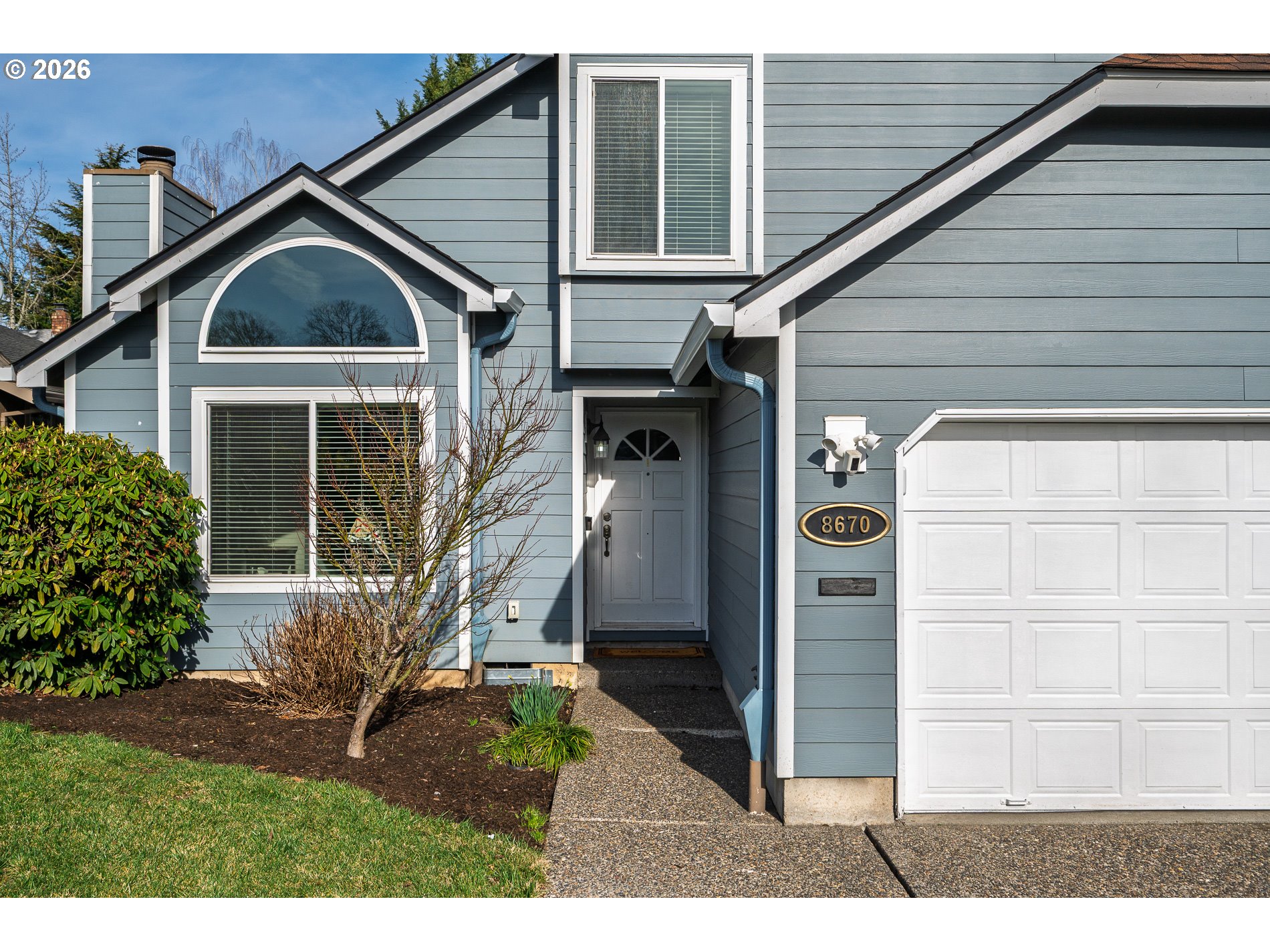 8670 Southwest Stratford Court Tigard, OR 97224 - Photo 5 of 42 a view of house with a outdoor space
