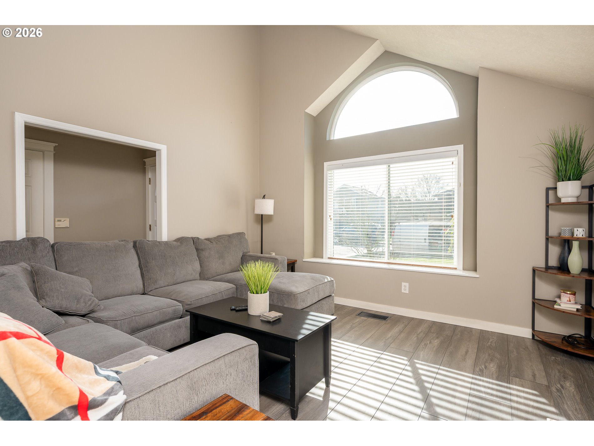 8670 Southwest Stratford Court Tigard, OR 97224 - Photo 8 of 42 a living room with furniture and a window