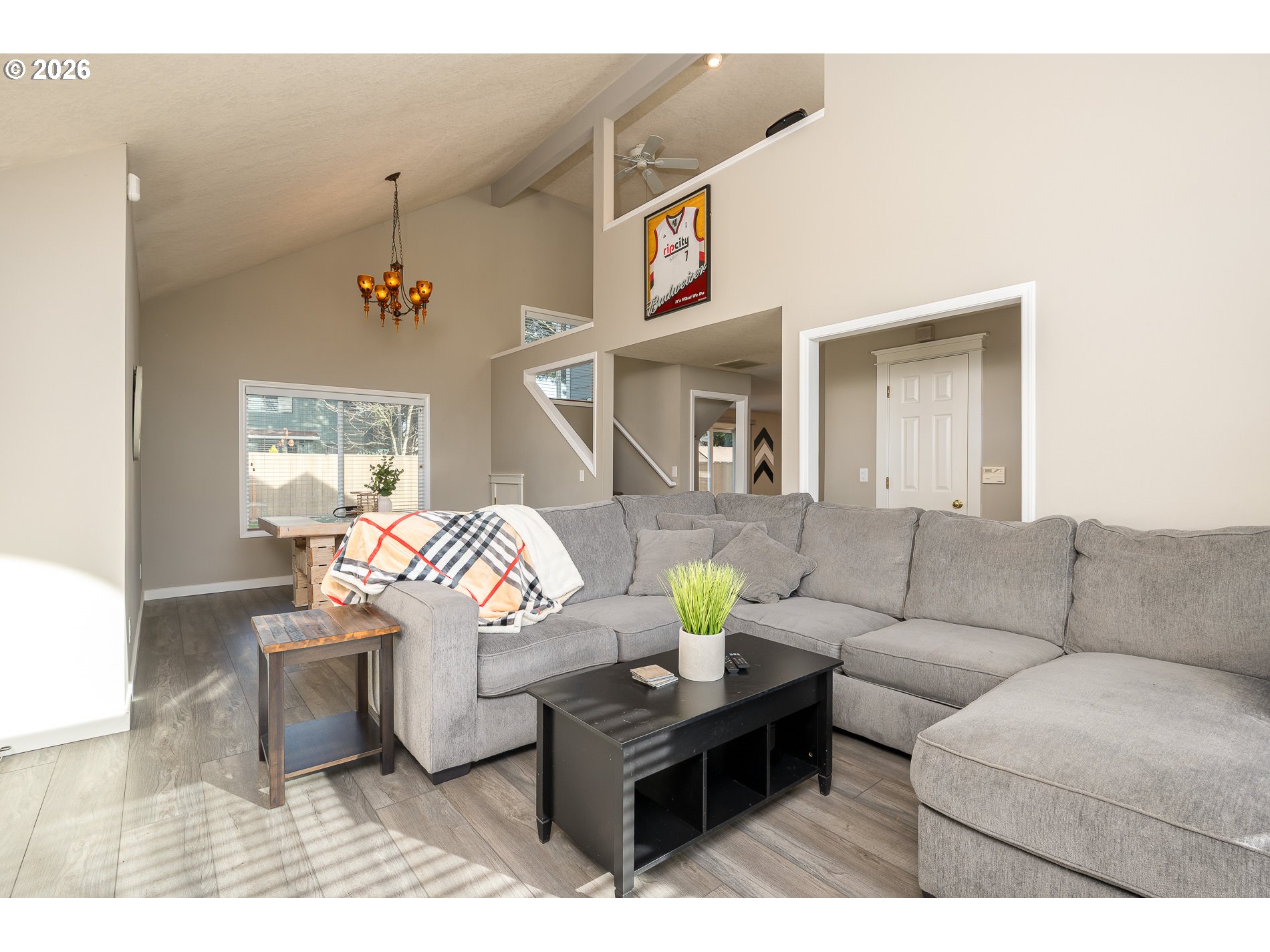8670 Southwest Stratford Court Tigard, OR 97224 - Photo 9 of 42 a living room with furniture and wooden floor