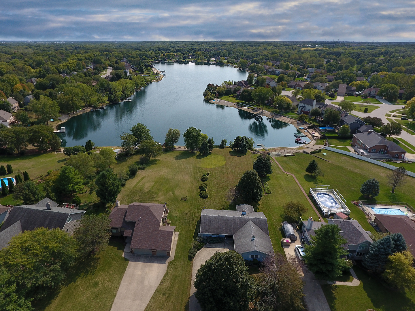 524 San Carlos Road Minooka, IL 60447 - Photo 5 of 6 an aerial view of a house with a lake view