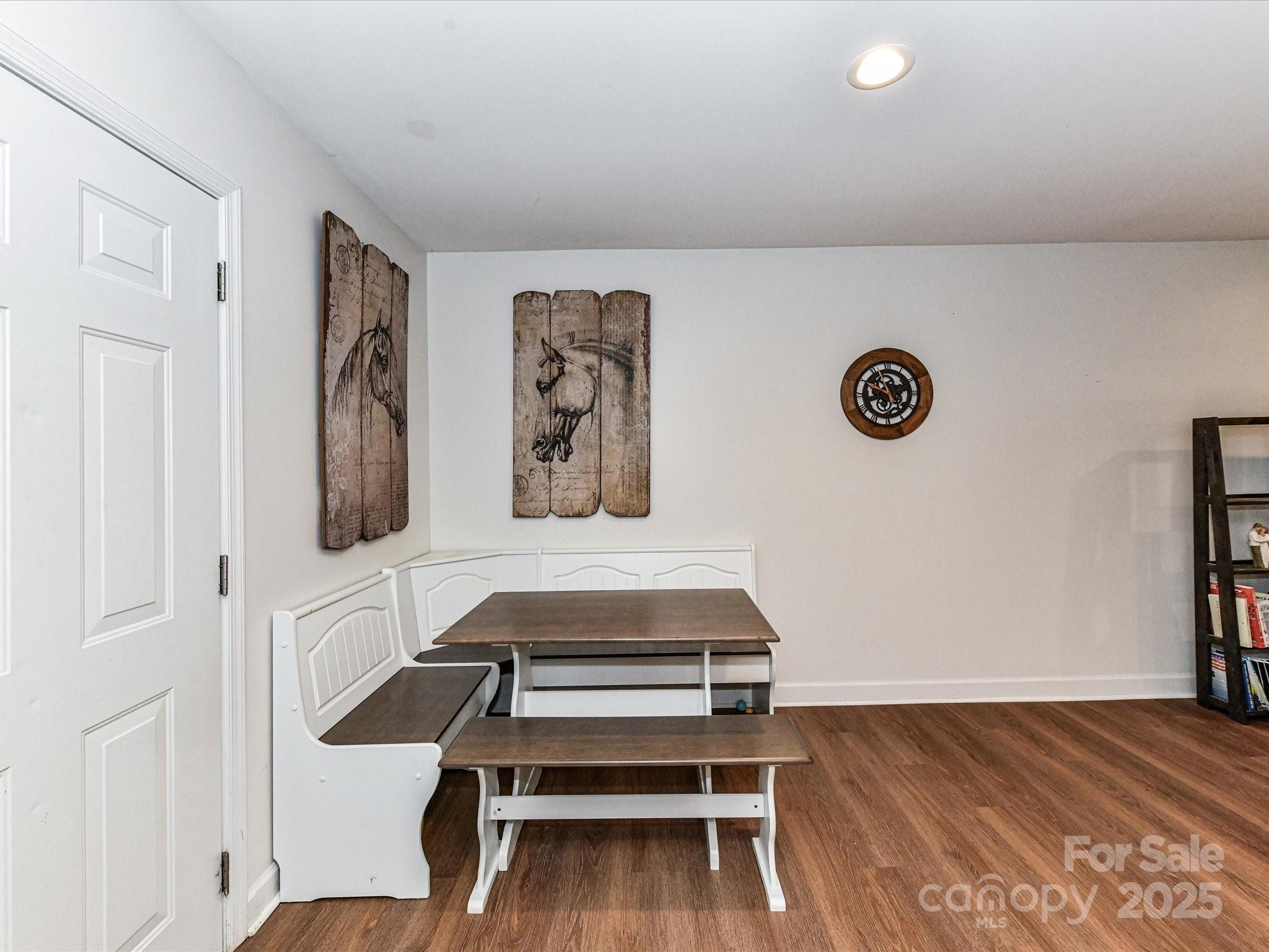 1620 Blueberry Street Mount Pleasant, NC 28124 - Photo 16 of 31 a view of a livingroom with wooden floor and white walls
