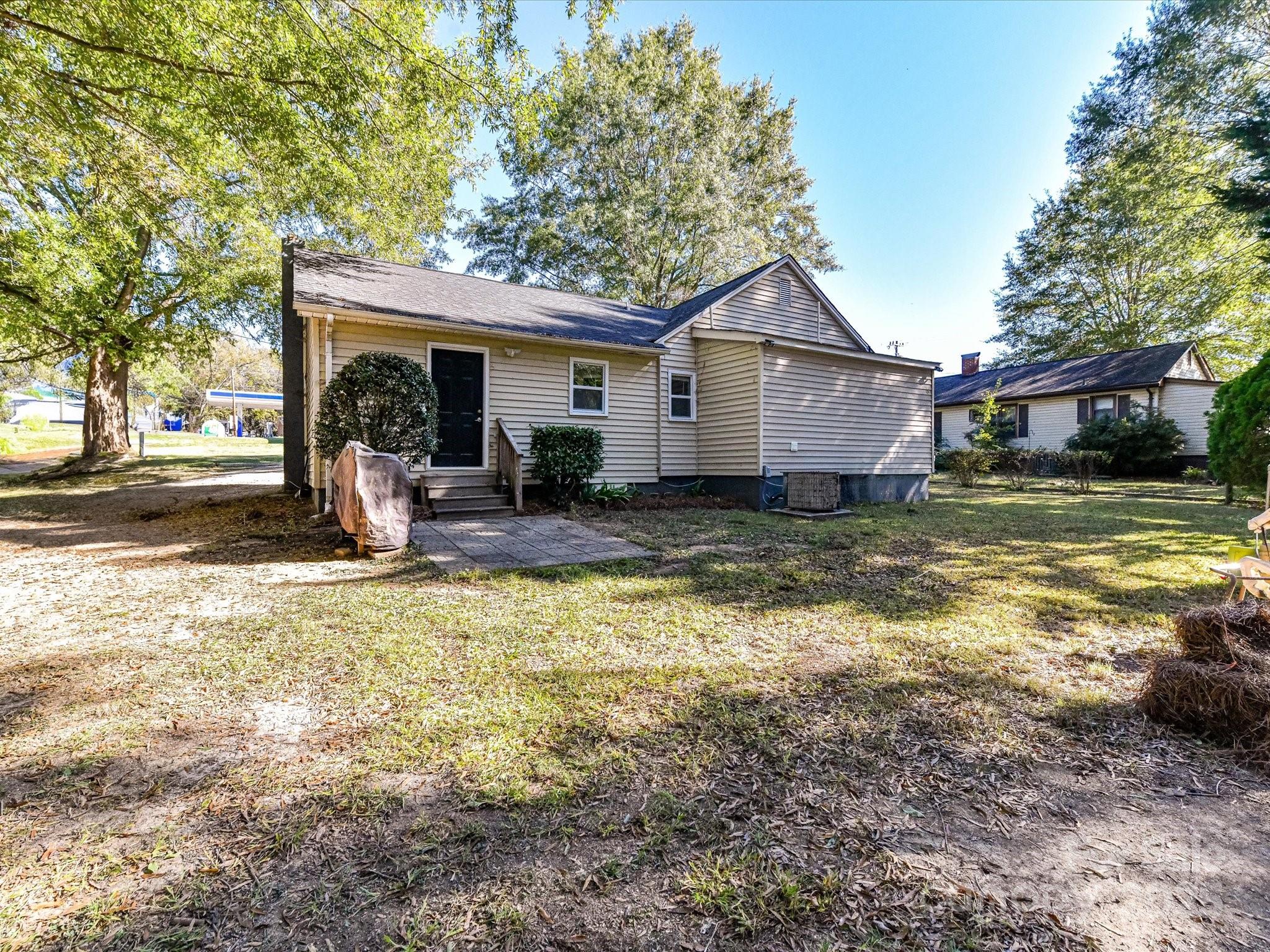 1620 Blueberry Street Mount Pleasant, NC 28124 - Photo 31 of 31 a view of a house with swimming pool next to a yard