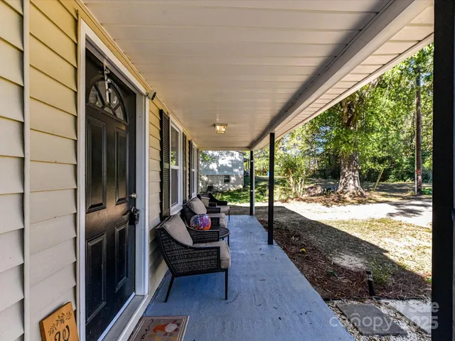 a view of a porch with furniture