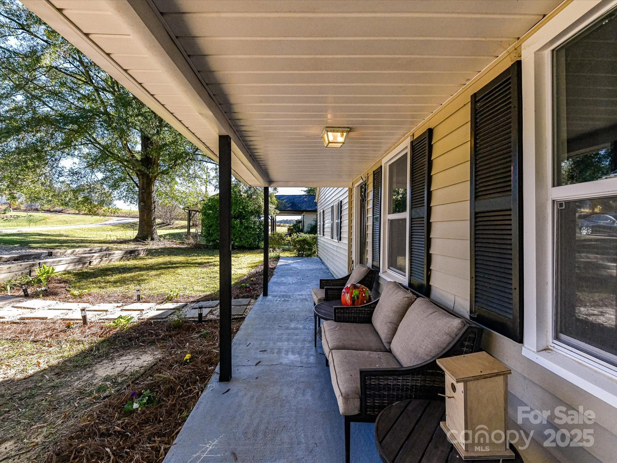 1620 Blueberry Street Mount Pleasant, NC 28124 - Photo 6 of 31 a outdoor space with patio the couches and pool table with chairs