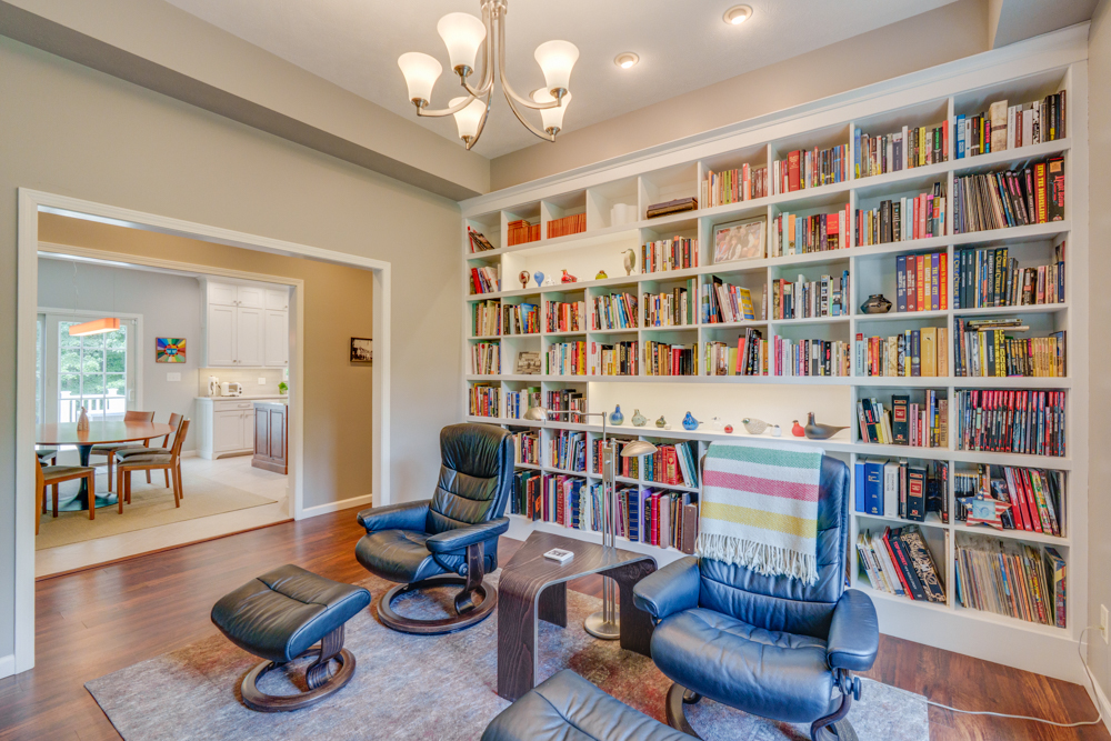3550 East Bishop Road Mount Vernon, IL 62864 - Photo 13 of 61 a living room with furniture and a book shelf