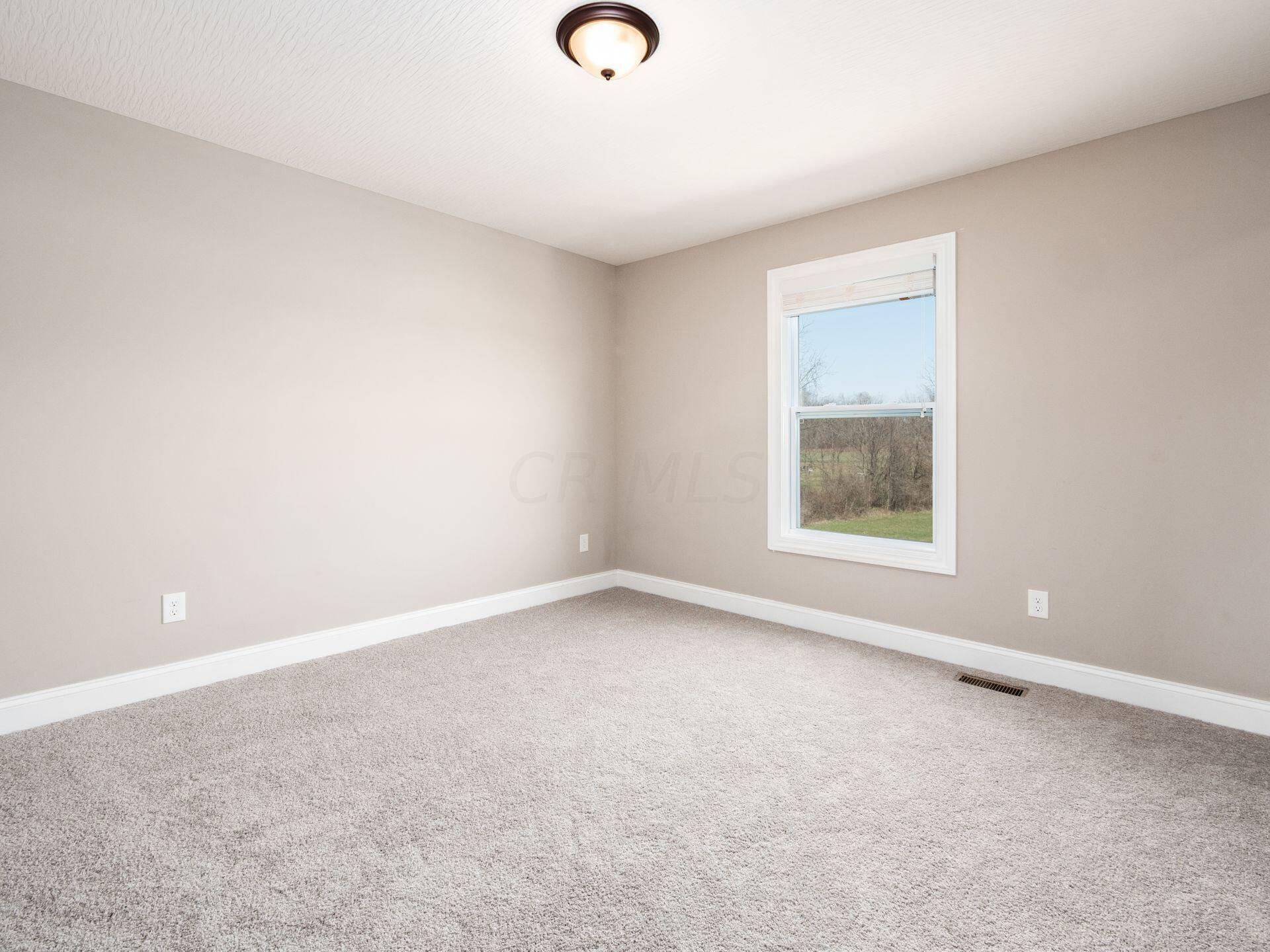 5408 Refugee Road Baltimore, OH 43105 - Photo 47 of 58 Secondary Bedroom w/ Overhead Light