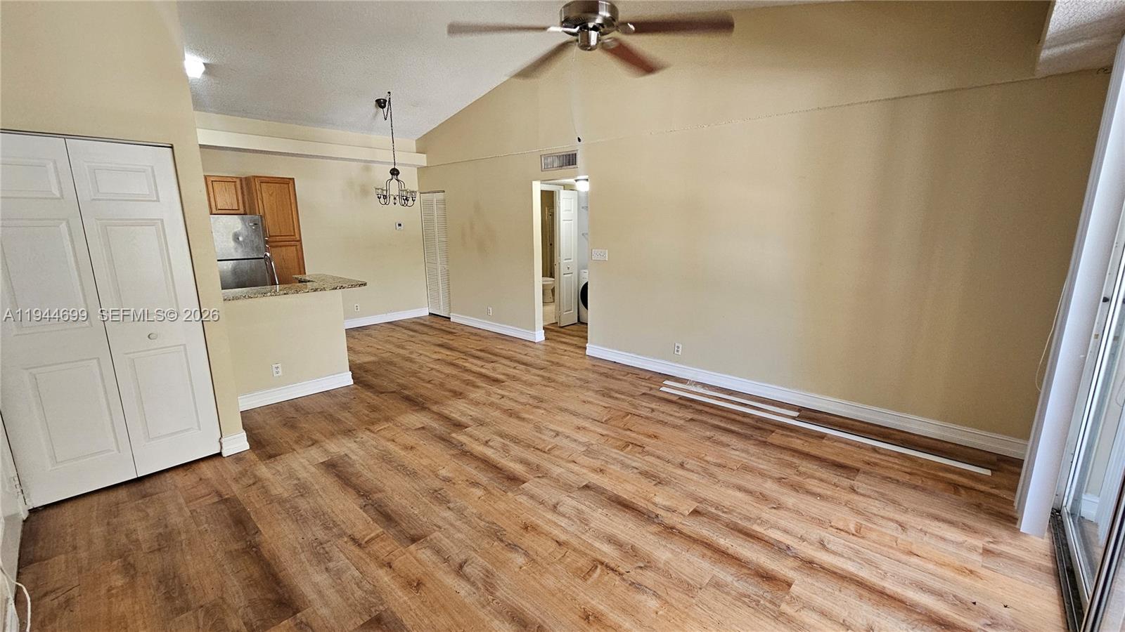 801 Lyons Road, Unit 19203 Coconut Creek, FL 33063 - Photo 6 of 28 a view of an empty room and a bathroom