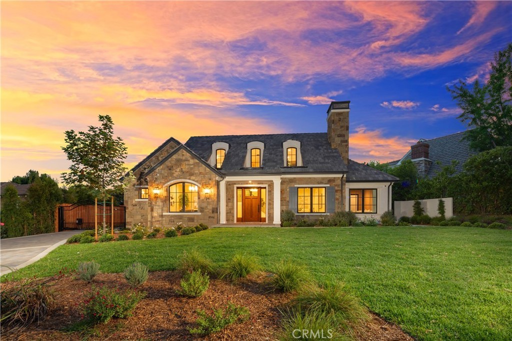 25 Corto Road Arcadia, CA 91007 - Photo 3 of 6 a front view of a house with a garden