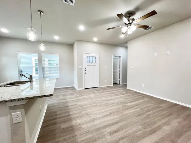 a view of a room with a chandelier