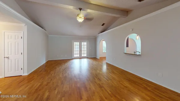 a view of a room that has a window in it