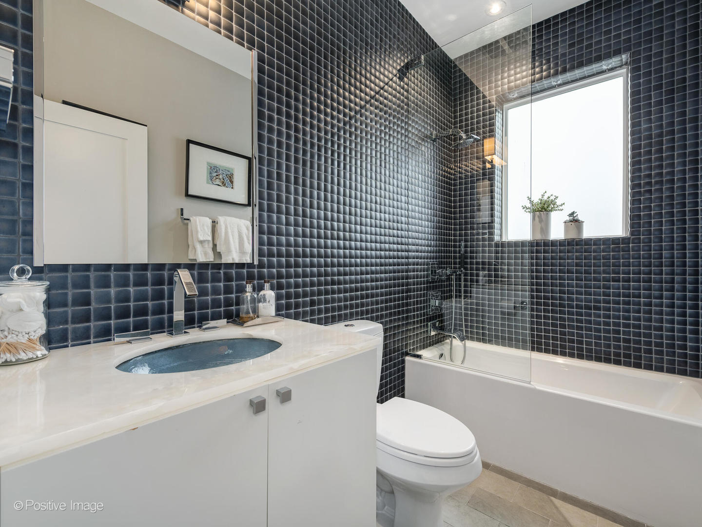 1846 North Mohawk Street, Unit PH Chicago, IL 60614 - Photo 16 of 37 a bathroom with a sink a toilet and shower