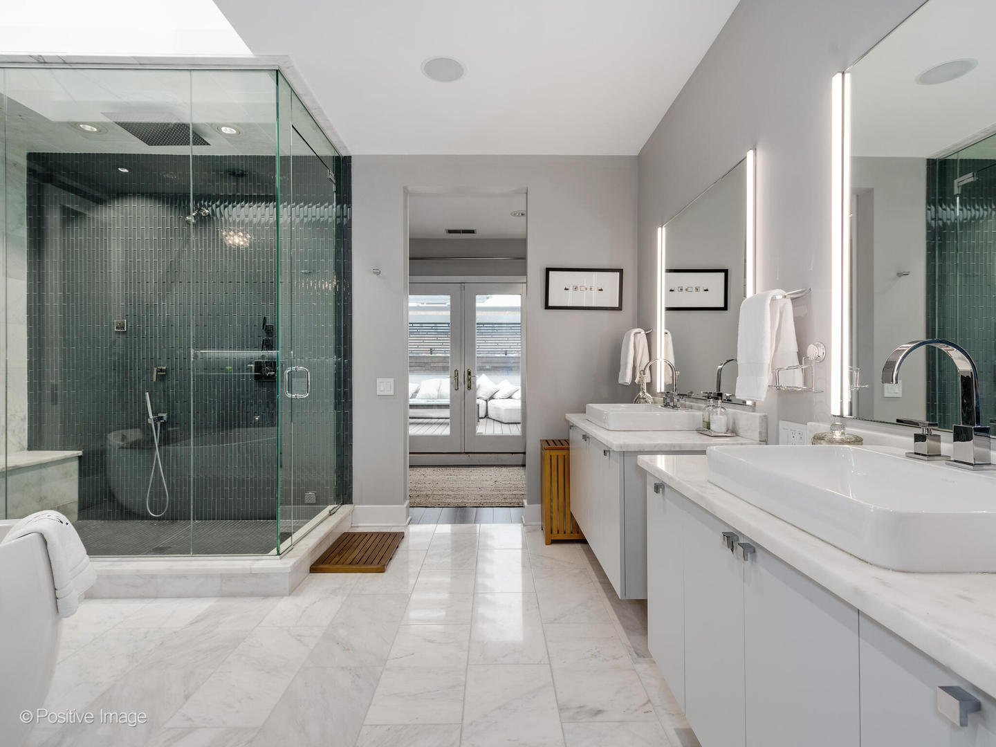 1846 North Mohawk Street, Unit PH Chicago, IL 60614 - Photo 24 of 37 a bathroom with a sink a toilet and shower