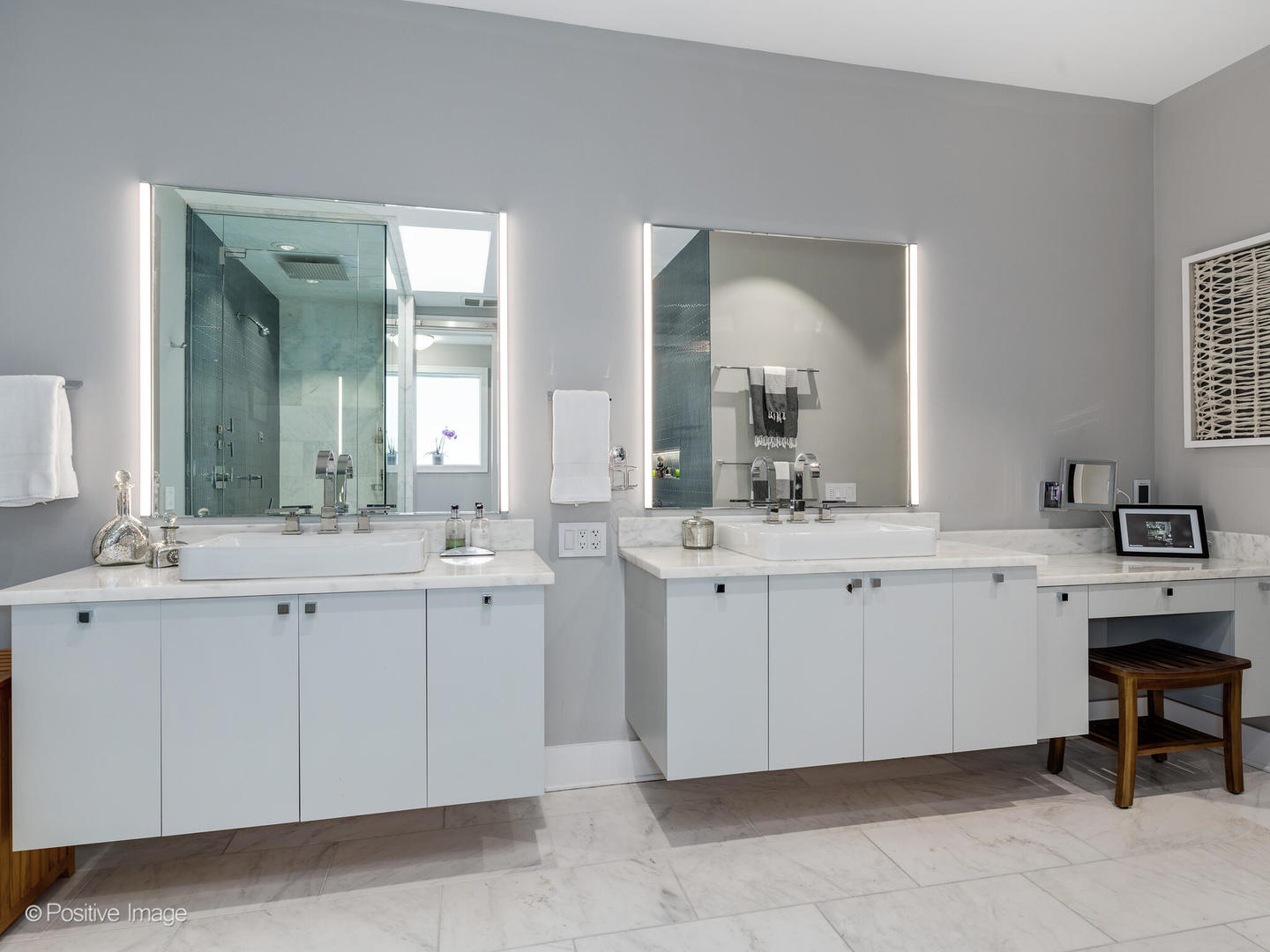 1846 North Mohawk Street, Unit PH Chicago, IL 60614 - Photo 25 of 37 a spacious bathroom with double vanity and a mirror