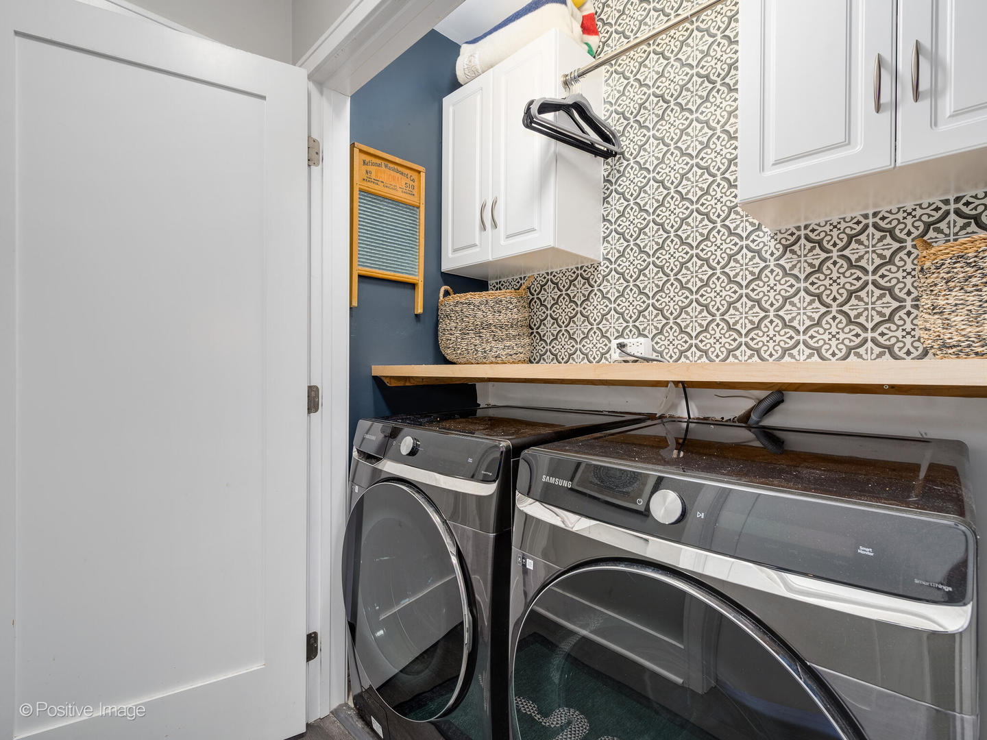 1846 North Mohawk Street, Unit PH Chicago, IL 60614 - Photo 29 of 37 a utility room with dryer and washer