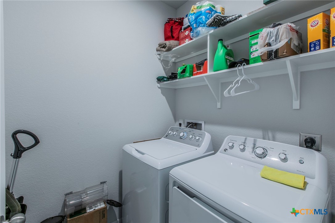 908 Coriander Road Temple, TX 76501 - Photo 19 of 28 a utility room with dryer and washer