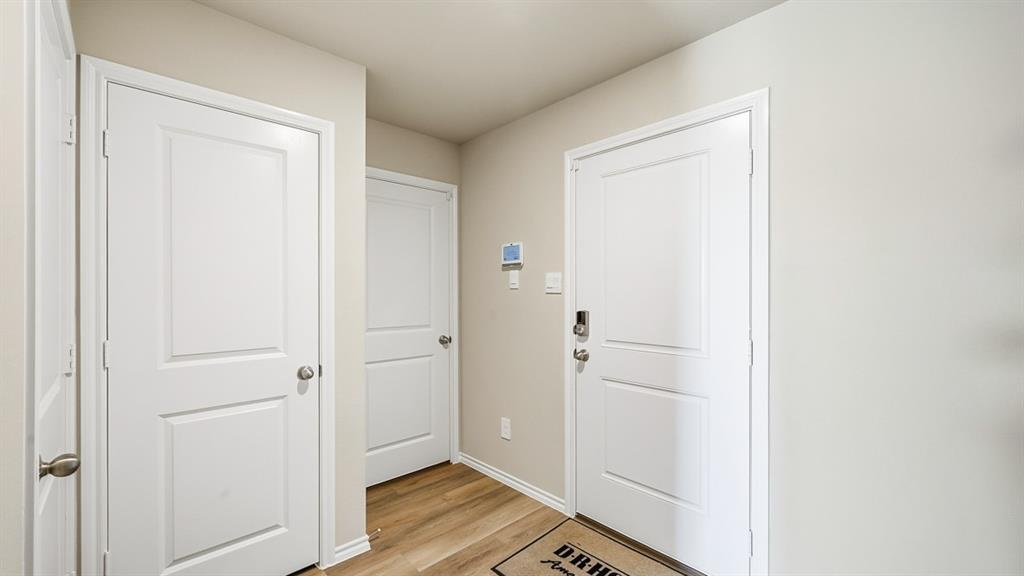 5512 Corduroy Road Krum, TX 76249 - Photo 33 of 38 a view of a room with wooden floor