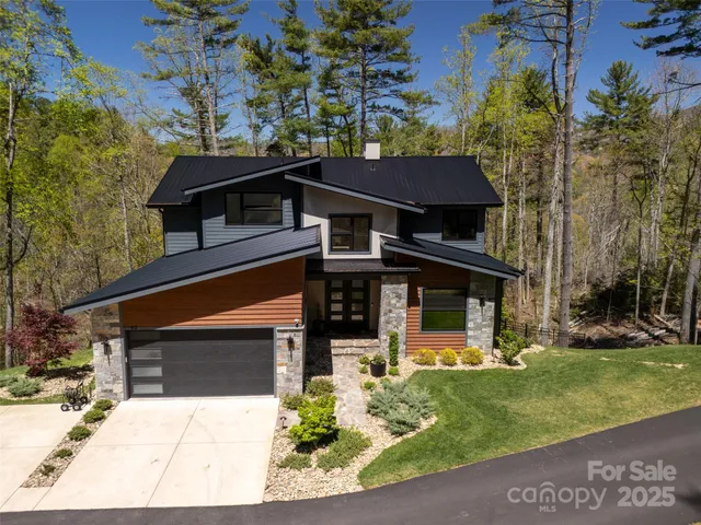 front view of a house with a small yard