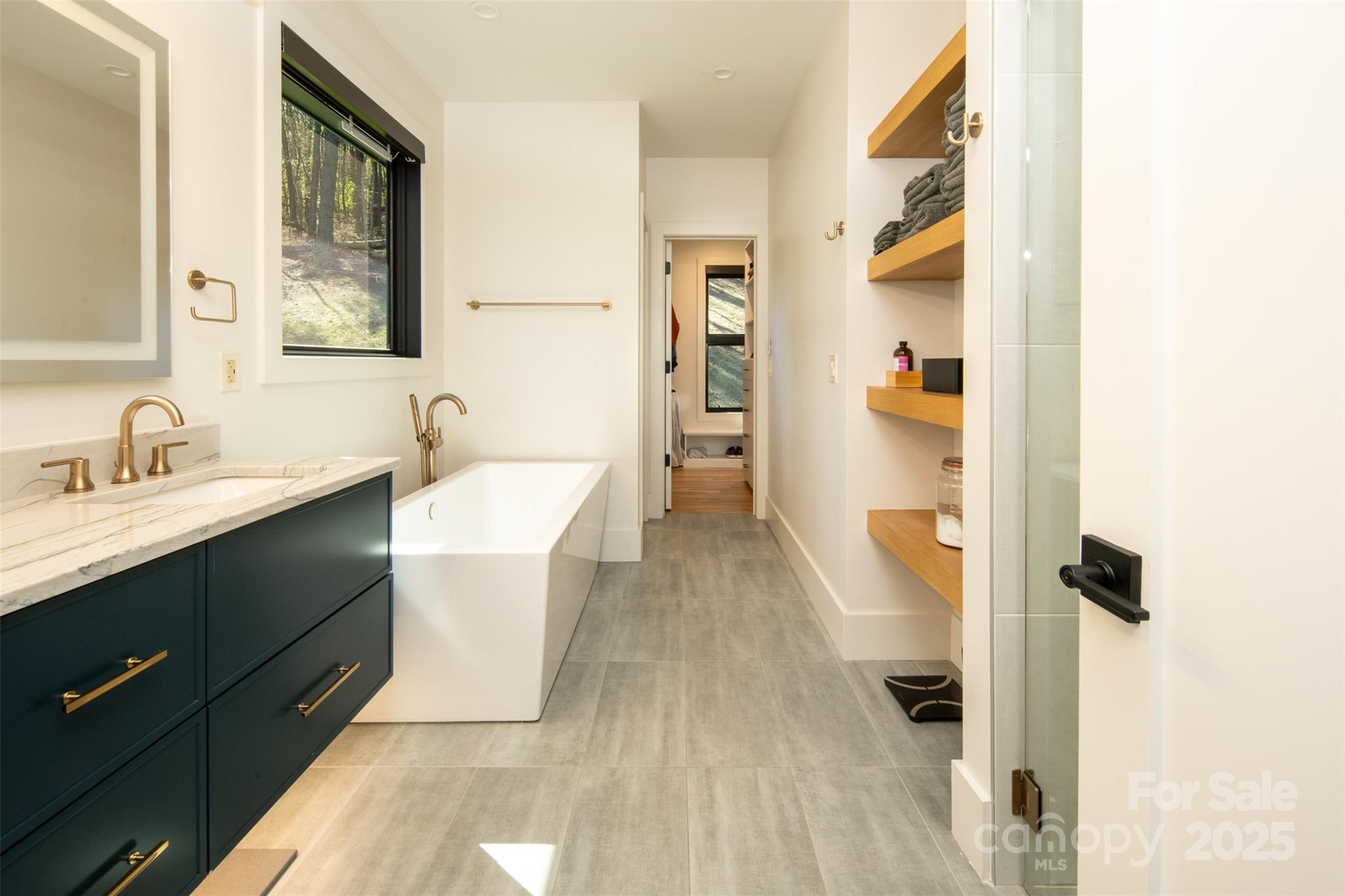 42 Spring Cove Road Asheville, NC 28804 - Photo 22 of 43 a bathroom with a sink and a mirror